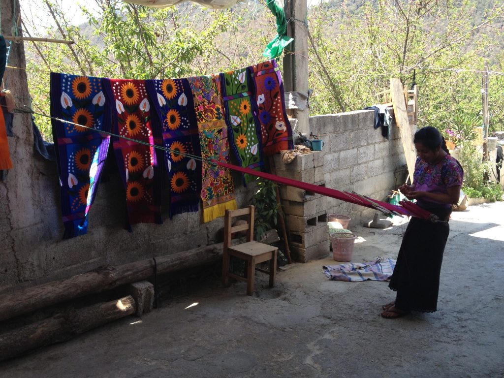 Weaving using a backstrap in San Lorenzo Zinacantán