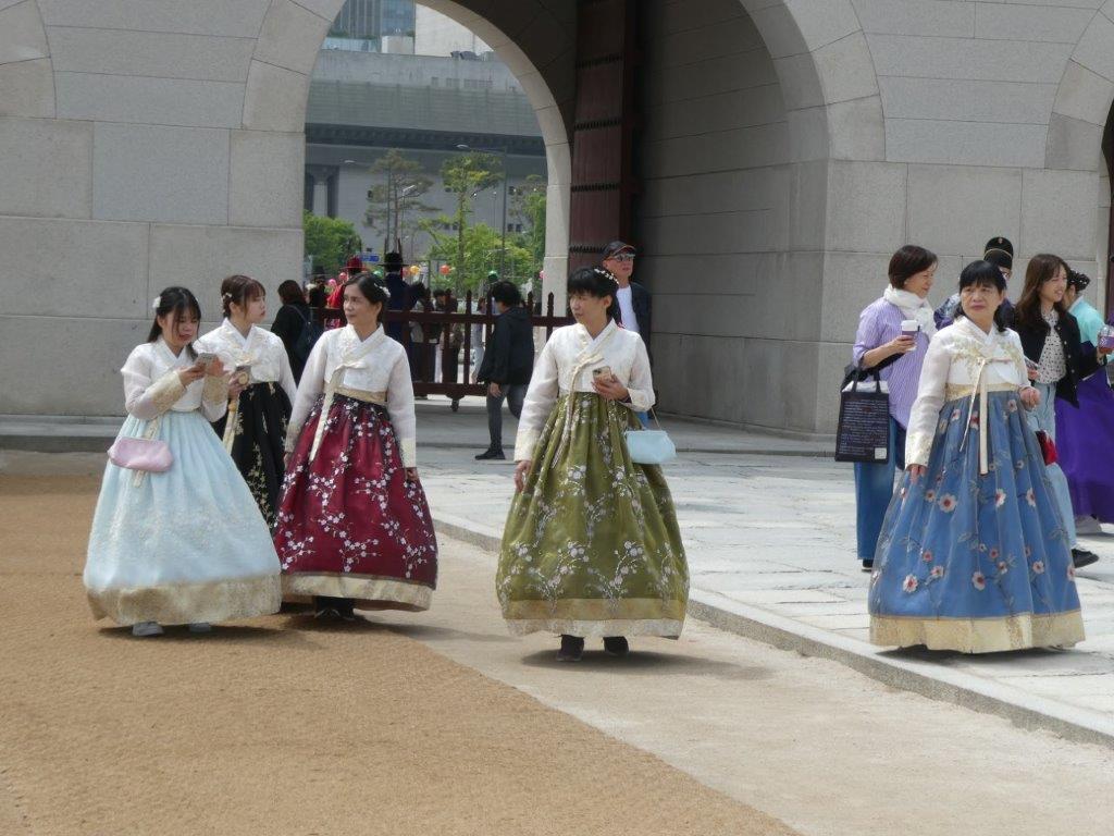 Local visitors in traditional Hanbok dress at Gyeongbokung Palace