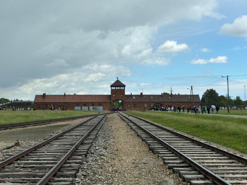 Gate of Death and train line at at the Auschwitz II-Birkenau site